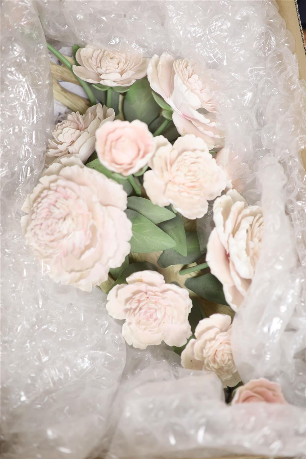 Twelve Boehm porcelain flower groups: No. 85 Chrysanthemum and Blossom, Pink Peony centrepiece and Iris silver shower, and a